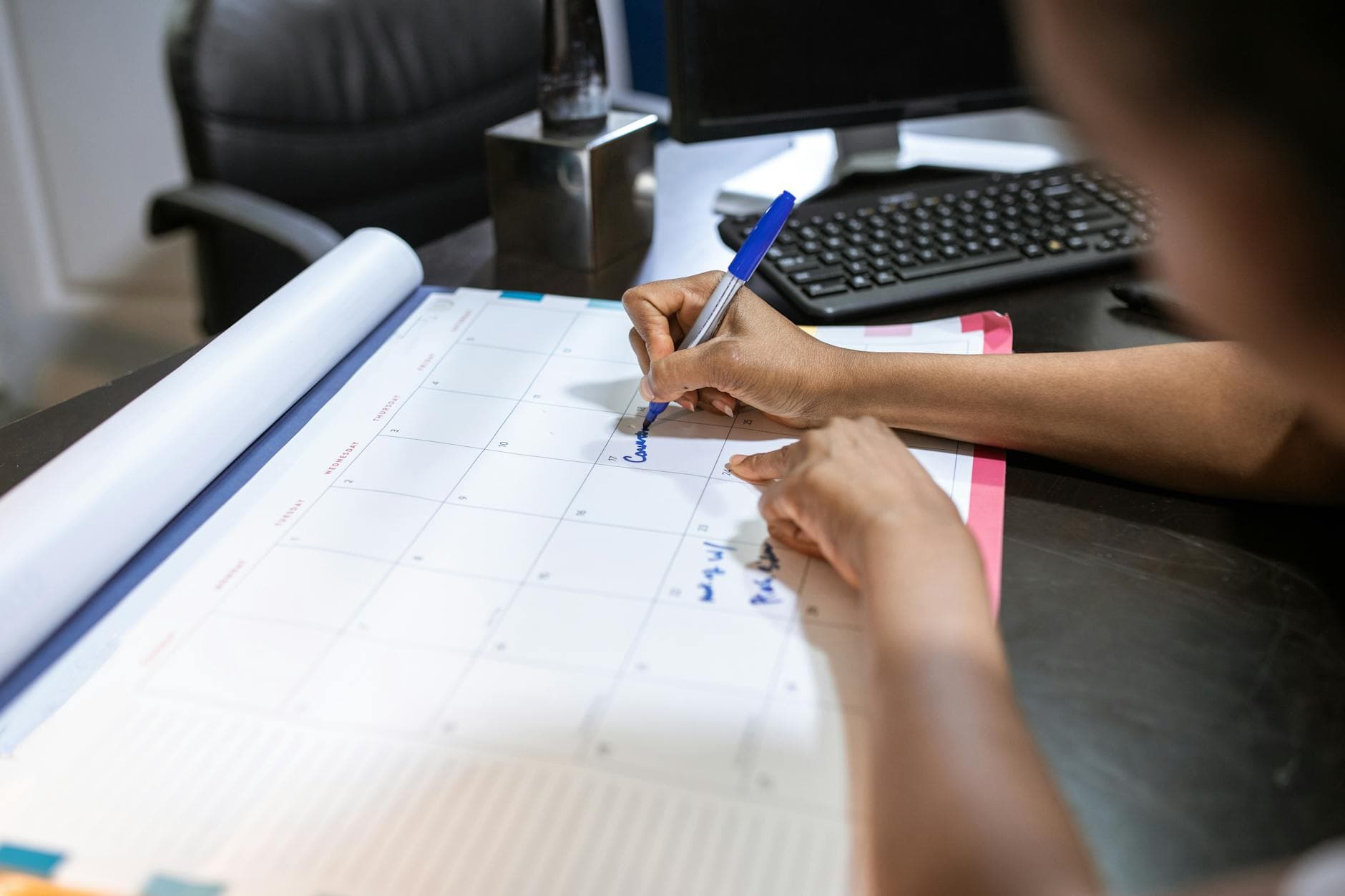 Wall calendar tracking weekly real estate appointments and goals — measuring 100 days of ACTIVATE production