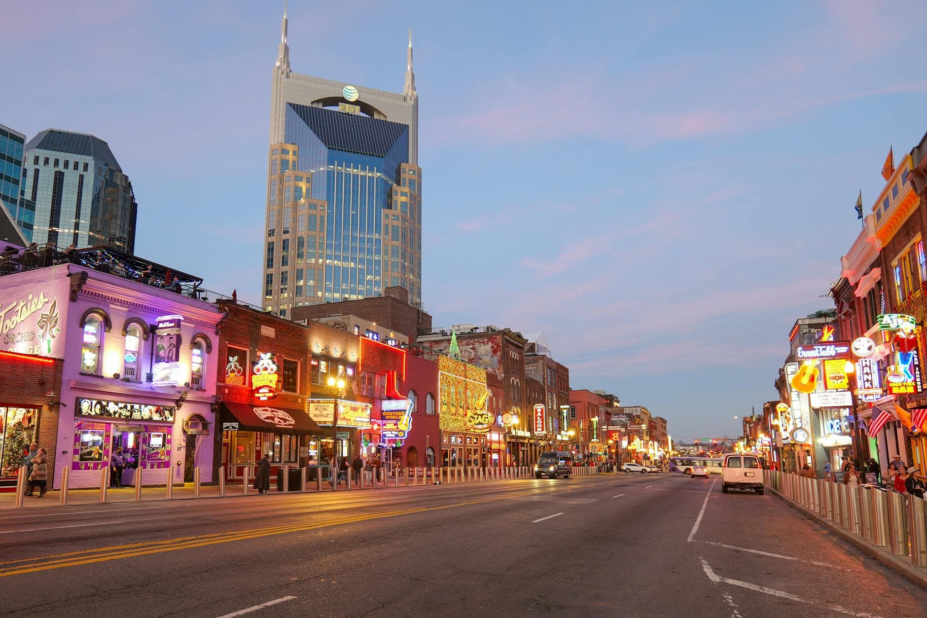 Sun-drenched street life in Nashville's 12 South neighborhood — boutique storefronts and walkable urban texture