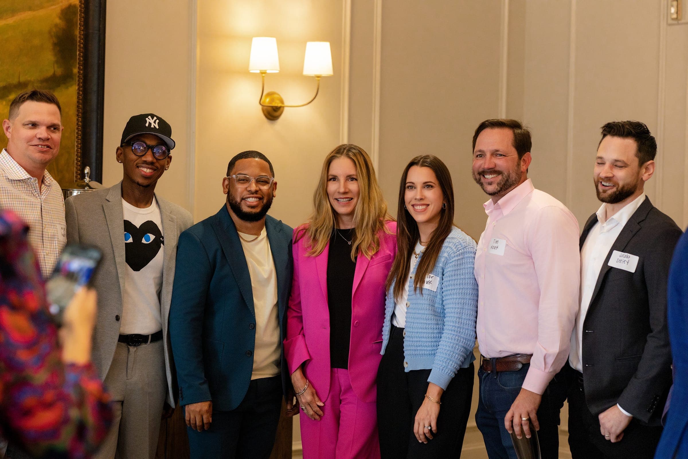 Agents and guests lined up smiling at a Middle Tennessee TrailBlazer recognition reception